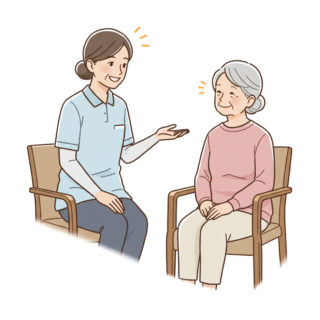 笑顔で高齢者と話す介護士